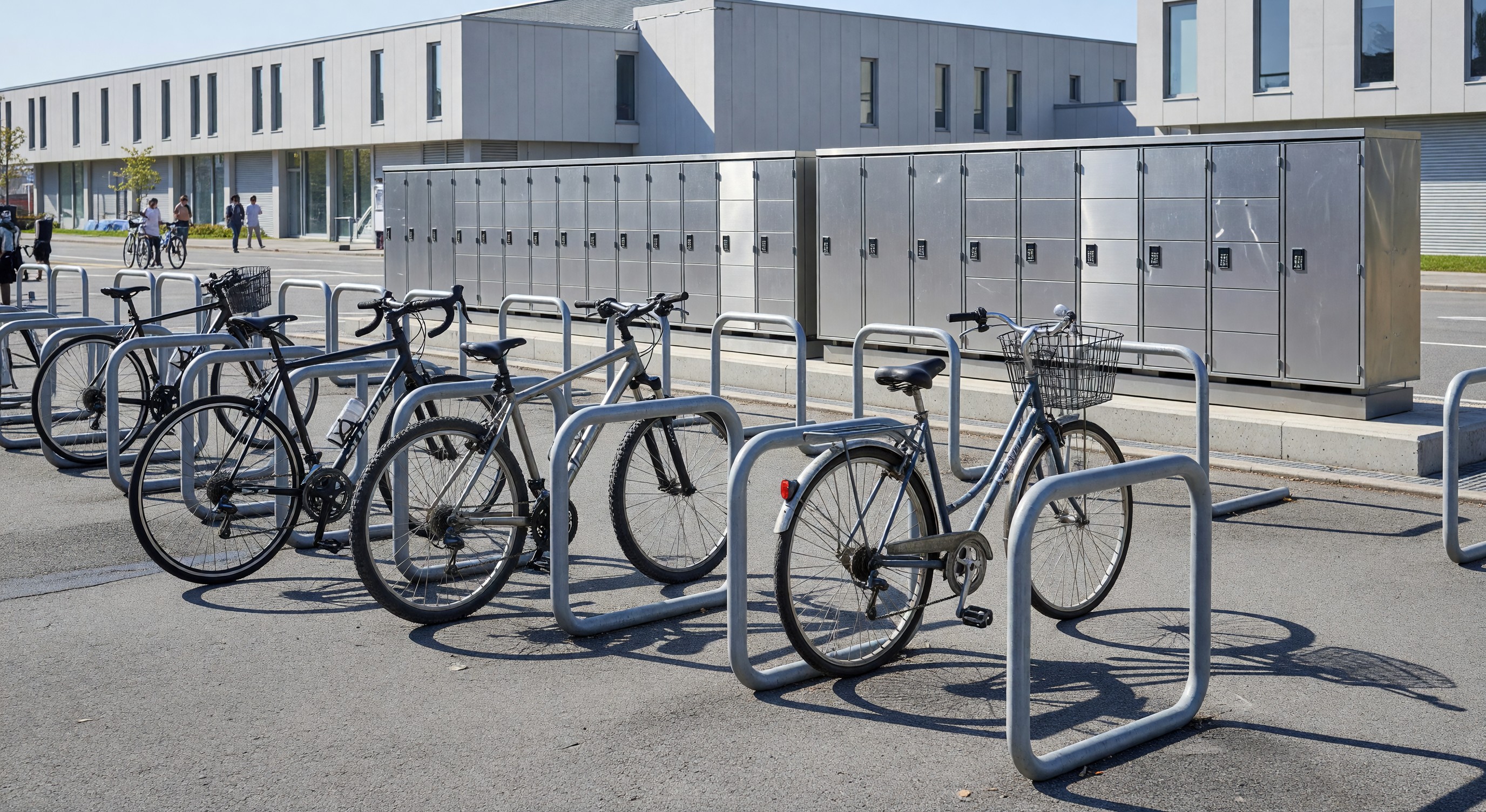 Bicycle parking area with inverted-U racks and secure bike storage lockers