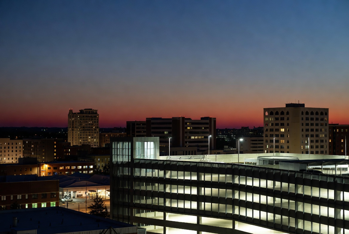 Little Rock Arkansas downtown skyline at dusk with parking structure