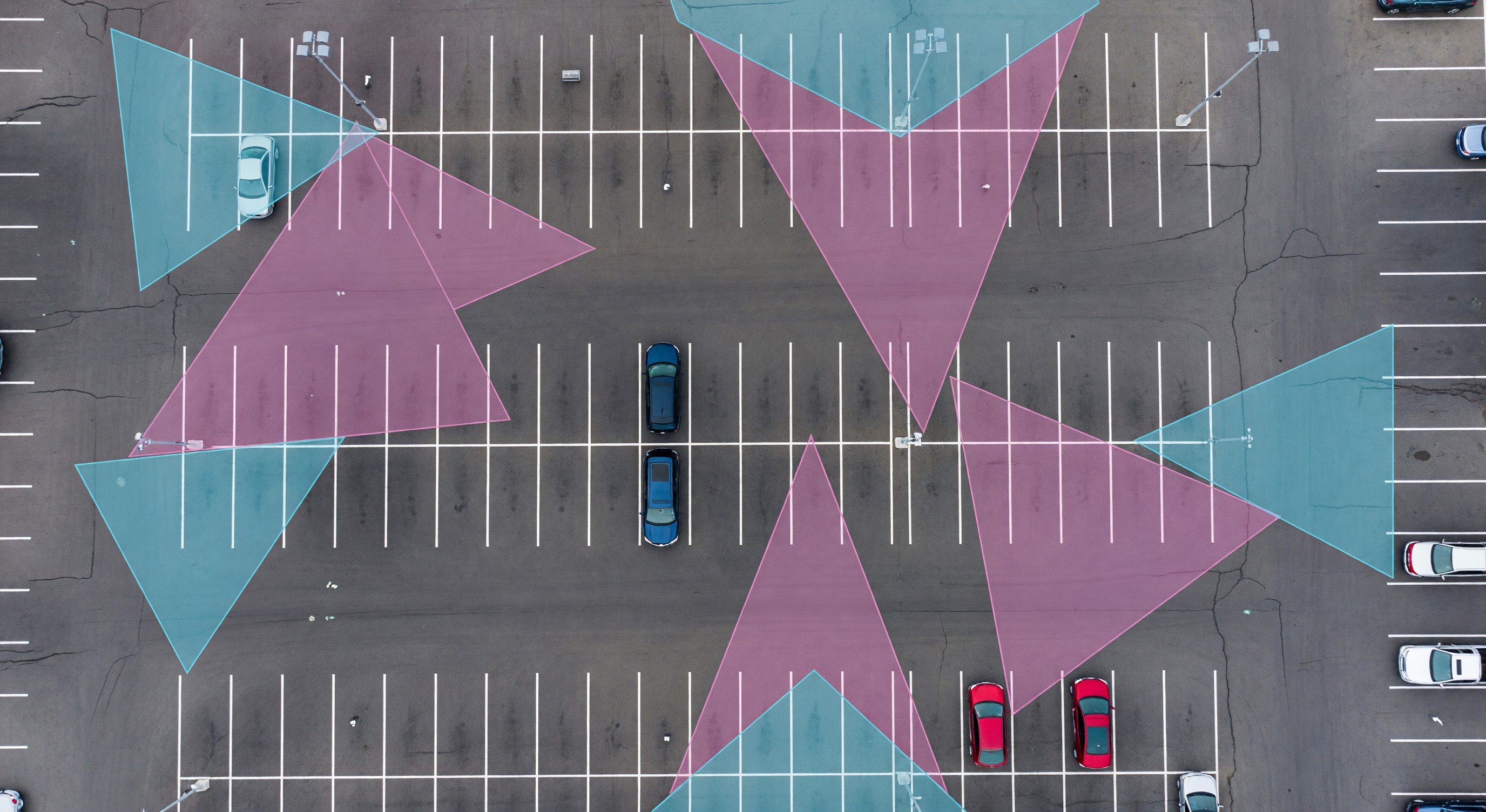 Overhead view of parking lot showing CCTV camera coverage zones and overlap areas