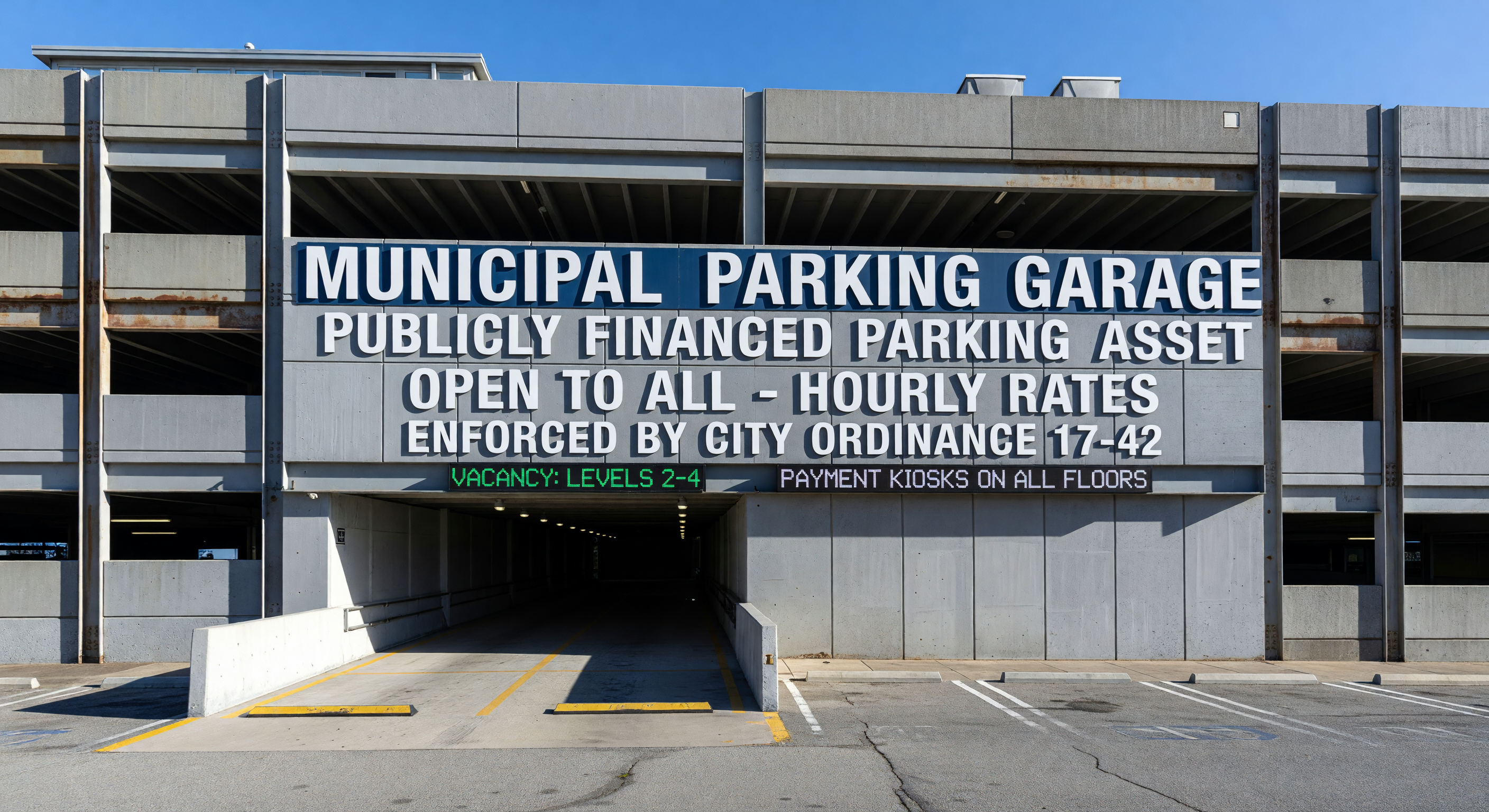 Municipal parking garage facade with facility signage, representing a publicly financed parking asset