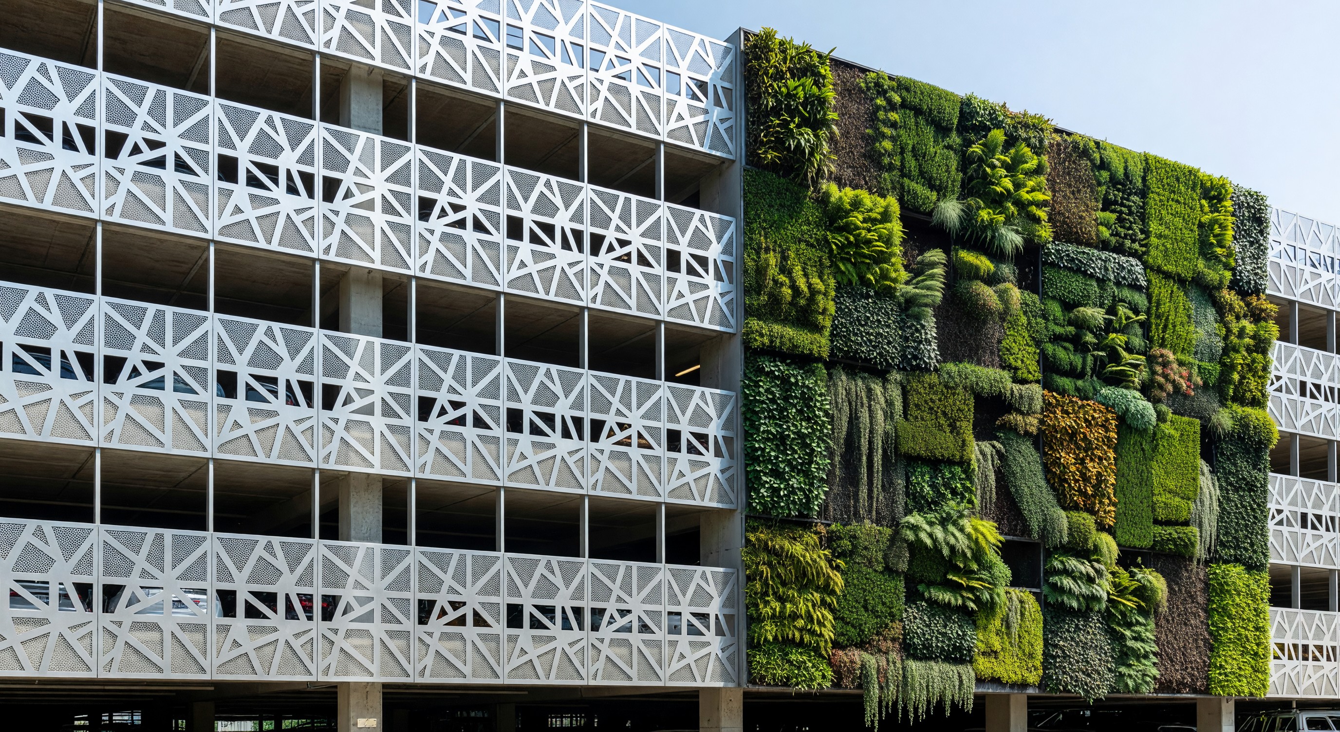 Parking structure with architectural metal screening and green wall facade treatment