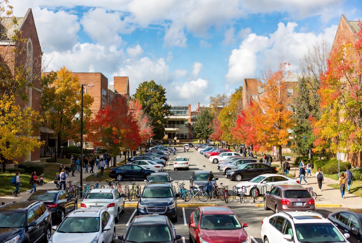 University campus parking lot with academic buildings and autumn trees