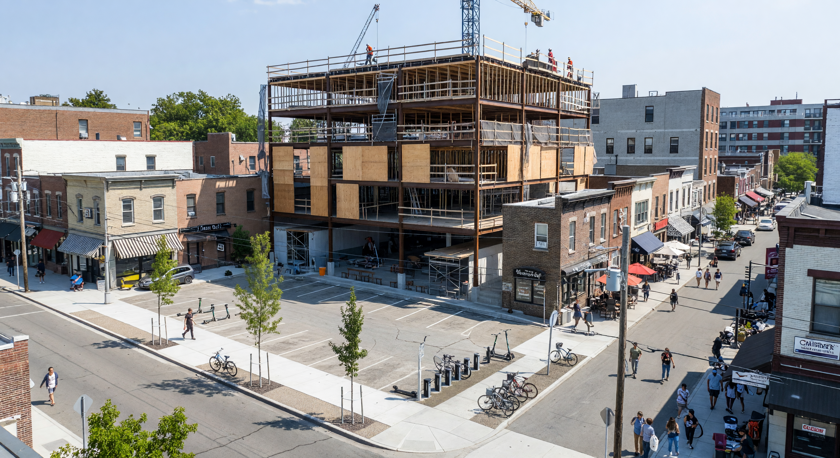 Mixed-use urban infill building under construction in a walkable commercial district